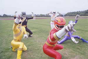 Red Ranger leads off the team on a soccer field