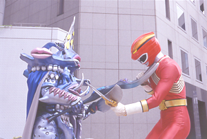 Red Ranger fighting Rasetsu