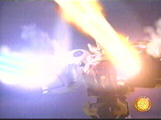 Wild Force Megazord (Double Knuckle Mode) fires the Bear Blasters
